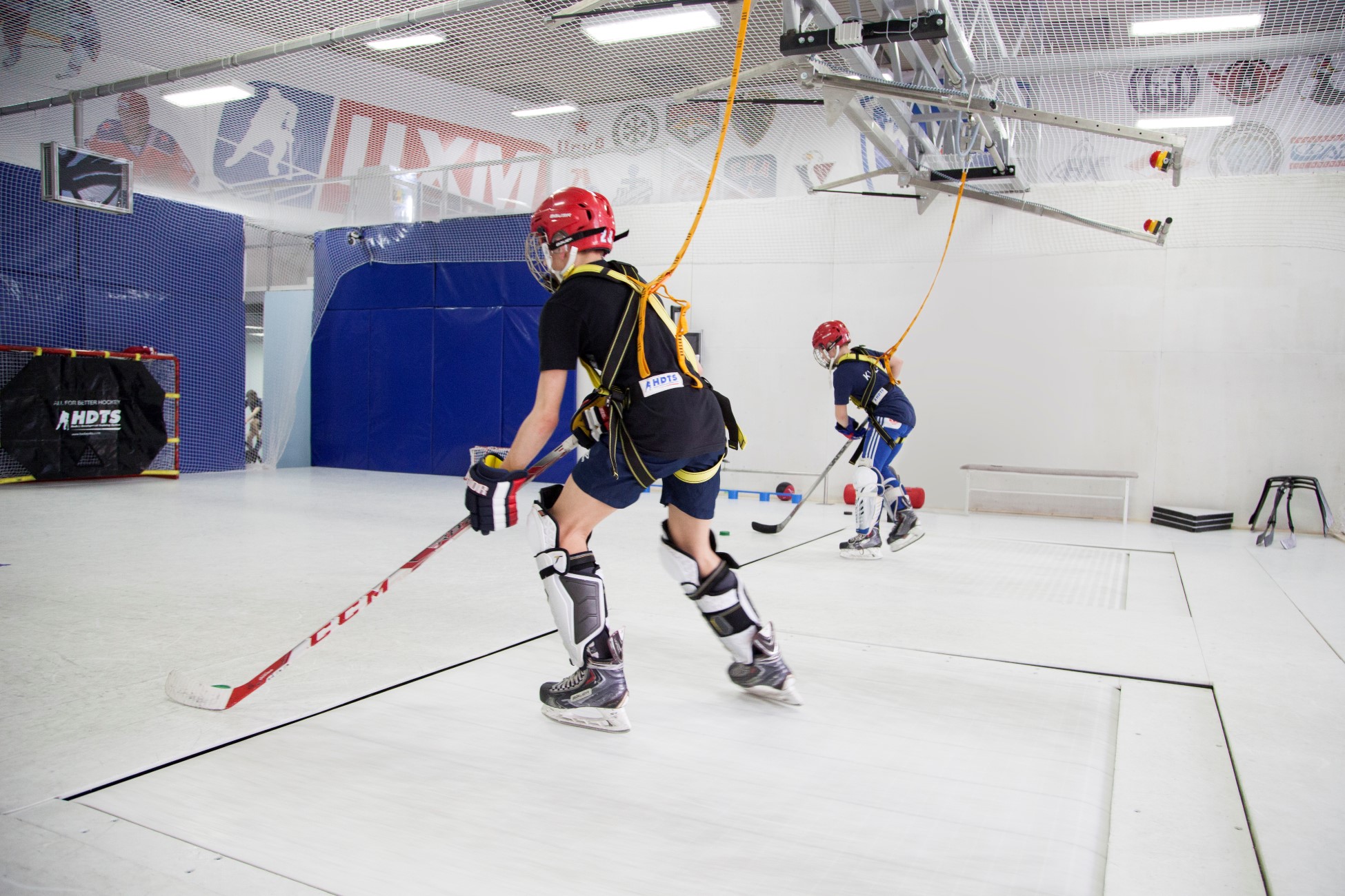Skatemill Training Centre Pic RELM Hockey Development Centre (HDC) is a premier facility dedicated to advancing hockey skills through innovative training methods. Featuring two state-of-the-art skatemills in the Fusion Skating & Shooting Zone, it provides athletes with an unmatched environment to refine their skating, shooting, and overall performance. Committed to developing talent and fostering excellence, HDC Kingston is a go-to destination for players striving to reach the next level.